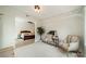 Bright bedroom and adjacent office space with desk, chair, and decorative tree at 2003 Briarwood Cir, Fort Mill, SC 29715