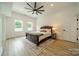 Inviting bedroom with a large ceiling fan and ample natural light, creating a serene atmosphere at 2003 Briarwood Cir, Fort Mill, SC 29715