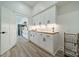 Bright, modern kitchen featuring stylish white cabinetry, wooden countertops, and modern black hardware at 2003 Briarwood Cir, Fort Mill, SC 29715