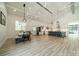 Open concept kitchen with an island and dining area featuring modern fixtures and natural light at 2003 Briarwood Cir, Fort Mill, SC 29715
