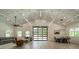 Bright living room features a stylish seating area and a dining space with modern light fixtures at 2003 Briarwood Cir, Fort Mill, SC 29715