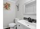 Charming bathroom features a modern vanity with black fixtures and tasteful wall decor at 208 Wellington Dr, Lincolnton, NC 28092