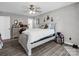 Comfortable bedroom featuring wood-look floors, ceiling fan, and a serene ambiance at 208 Wellington Dr, Lincolnton, NC 28092