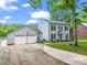 Charming two-story home with a spacious two-car garage and a well-manicured lawn at 208 Wellington Dr, Lincolnton, NC 28092