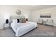 Comfortable bedroom featuring neutral tones, soft carpet, and stylish decor at 215 Tillery Ln # 756P, Mount Gilead, NC 27306