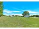 Expansive backyard with lush green grass and a view of the house at 221 Abner Rd, Stony Point, NC 28678