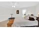 Bright bedroom featuring a cozy bed, window view, and small trampoline at 221 Abner Rd, Stony Point, NC 28678