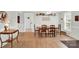 Bright dining room featuring hardwood floors, a wooden table, and ample natural light at 221 Abner Rd, Stony Point, NC 28678