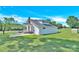 Charming home with white siding, a brick chimney, and a lovely front porch at 221 Abner Rd, Stony Point, NC 28678