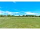 Large open lot surrounded by mature trees and lush greenery at 221 Abner Rd, Stony Point, NC 28678