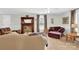 Spacious living area with hardwood floors, a decorative fireplace, and plenty of seating at 221 Abner Rd, Stony Point, NC 28678