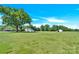 A well-maintained property featuring a home and outbuilding at 221 Abner Rd, Stony Point, NC 28678