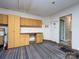 Garage space with carpet and built in cabinets and desk space at 2502 Breuster Dr, Charlotte, NC 28210