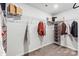 Well-organized walk-in closet with ample shelving and hanging space for optimal storage solutions at 2585 Blue Sky Meadows Dr, Monroe, NC 28110