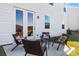 Outdoor patio with comfortable seating and a cozy ambiance, perfect for relaxing and enjoying the fresh air at 2585 Blue Sky Meadows Dr, Monroe, NC 28110