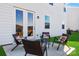 Outdoor patio with comfortable seating and a cozy ambiance, perfect for relaxing and enjoying the fresh air at 2585 Blue Sky Meadows Dr, Monroe, NC 28110
