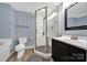 Bathroom boasts a walk-in shower, dark vanity, and modern fixtures at 2626 Lilly Mill Rd, Charlotte, NC 28210