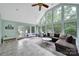 Beautiful sunroom filled with natural light from large windows and an open layout at 2626 Lilly Mill Rd, Charlotte, NC 28210