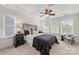 Serene bedroom with trey ceiling, plush carpet, and an abundance of natural light at 2638 Double Oaks Rd, Charlotte, NC 28206