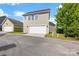 Home and detached garage with clean, neutral siding at 2638 Double Oaks Rd, Charlotte, NC 28206