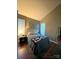 Comfortable bedroom with good natural light at 300 S Cedar St # 2, Charlotte, NC 28202