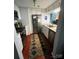 Updated kitchen featuring stainless steel appliances and tile backsplash at 300 S Cedar St # 2, Charlotte, NC 28202