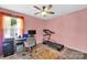 Pink bedroom features computer, printer, and treadmill setup for home office at 3578 Saddlebrook Dr, Midland, NC 28107
