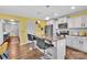 Modern kitchen features a granite countertop island with barstool seating, stainless steel appliances at 3578 Saddlebrook Dr, Midland, NC 28107
