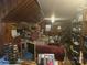 A living room with wood paneling and filled with furniture at 3712 Avalon Ave, Charlotte, NC 28208