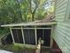 Exterior view of a house featuring a screened porch at 3712 Avalon Ave, Charlotte, NC 28208