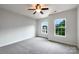 Bedroom featuring carpet, great natural light, and a ceiling fan at 3904 Hounslow Ln, Harrisburg, NC 28075