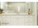 Bright bathroom boasts a double sink vanity with white cabinetry and framed mirrors, with a glass-enclosed shower at 3915 Horsham St, Indian Land, SC 29707