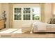 Sun-drenched main bedroom features a large window, light-colored walls, and views of outdoors at 3915 Horsham St, Indian Land, SC 29707