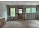Unfinished living room with natural light, ready for your custom design at 411 Woodlawn Ave, Gastonia, NC 28052