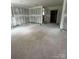 Unfinished living room offering a blank canvas for customization and design at 411 Woodlawn Ave, Gastonia, NC 28052