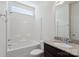 Bathroom featuring a shower over tub, granite topped vanity, and tiled backsplash at 4527 Dover Ct, Denver, NC 28037