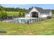 Community pool area with lounge chairs, sunbathing and a covered pavilion at 4527 Dover Ct, Denver, NC 28037