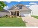 Charming single-Gathering home with well-manicured lawn and attached garage at 4527 Dover Ct, Denver, NC 28037