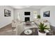 Open-concept living room showcasing a fireplace and neutral color palette at 4527 Dover Ct, Denver, NC 28037