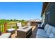 Spacious outdoor deck featuring comfortable seating, a fire pit, and a hot tub with scenic views at 475 Hunton Forest Nw Dr, Concord, NC 28027