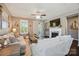 Comfortable living room with lots of seating, ceiling fan, and a fireplace at 475 Hunton Forest Nw Dr, Concord, NC 28027