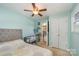 Comfortable bedroom with ample storage space and access to an en-suite bathroom and closet at 4960 Longfield St, Claremont, NC 28610