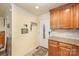 Inviting entryway featuring a neutral palette, convenient coat rack, and tiled flooring at 4960 Longfield St, Claremont, NC 28610