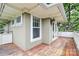 Covered balcony, wood decking, and exterior access at 526 N Davidson St, Charlotte, NC 28202