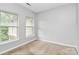 Light-filled bedroom with carpet and sunny window views at 526 N Davidson St, Charlotte, NC 28202