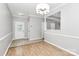 Open entryway leading to the main area featuring hardwood floors at 526 N Davidson St, Charlotte, NC 28202