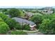 Beautiful exterior view of condo nestled among mature trees at 526 N Davidson St, Charlotte, NC 28202