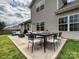 Staged backyard and patio with outdoor furniture creating an inviting space for relaxation and entertaining at 5355 Hackberry Sw Ln, Concord, NC 28027