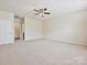 Large bedroom with ceiling fan and spacious closet at 5355 Hackberry Sw Ln, Concord, NC 28027