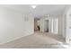 Large bonus room with plush carpet, neutral walls, and ample space for recreation or relaxation, perfect for Gathering enjoyment at 5634-A Galloway Dr # 96P, Stanfield, NC 28163